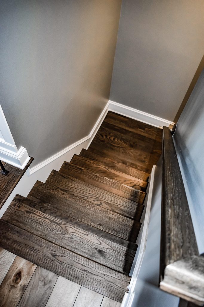 wide plank flooring on stairs